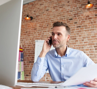 Man focused while working computer