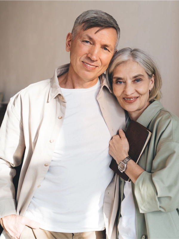 Happy elderly couple hugging in modern room 2024 01 26 18 39 52 utc