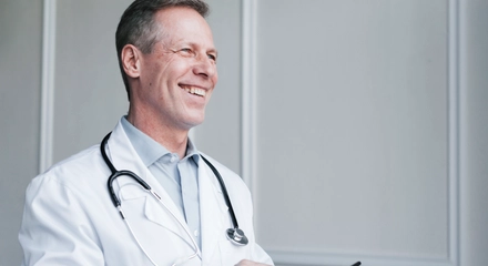 Doctor making phone call